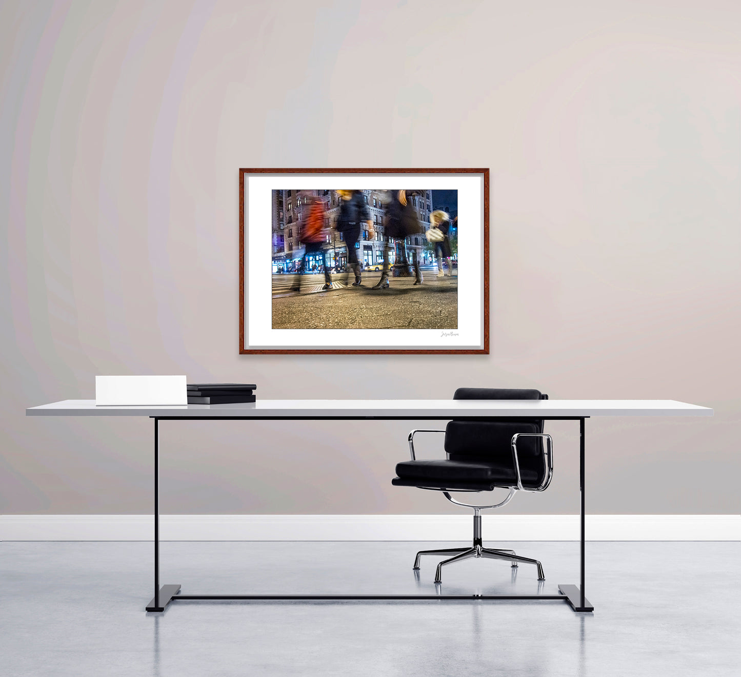 Photograph of 4 blurry people walking at night in New York City with low perspective