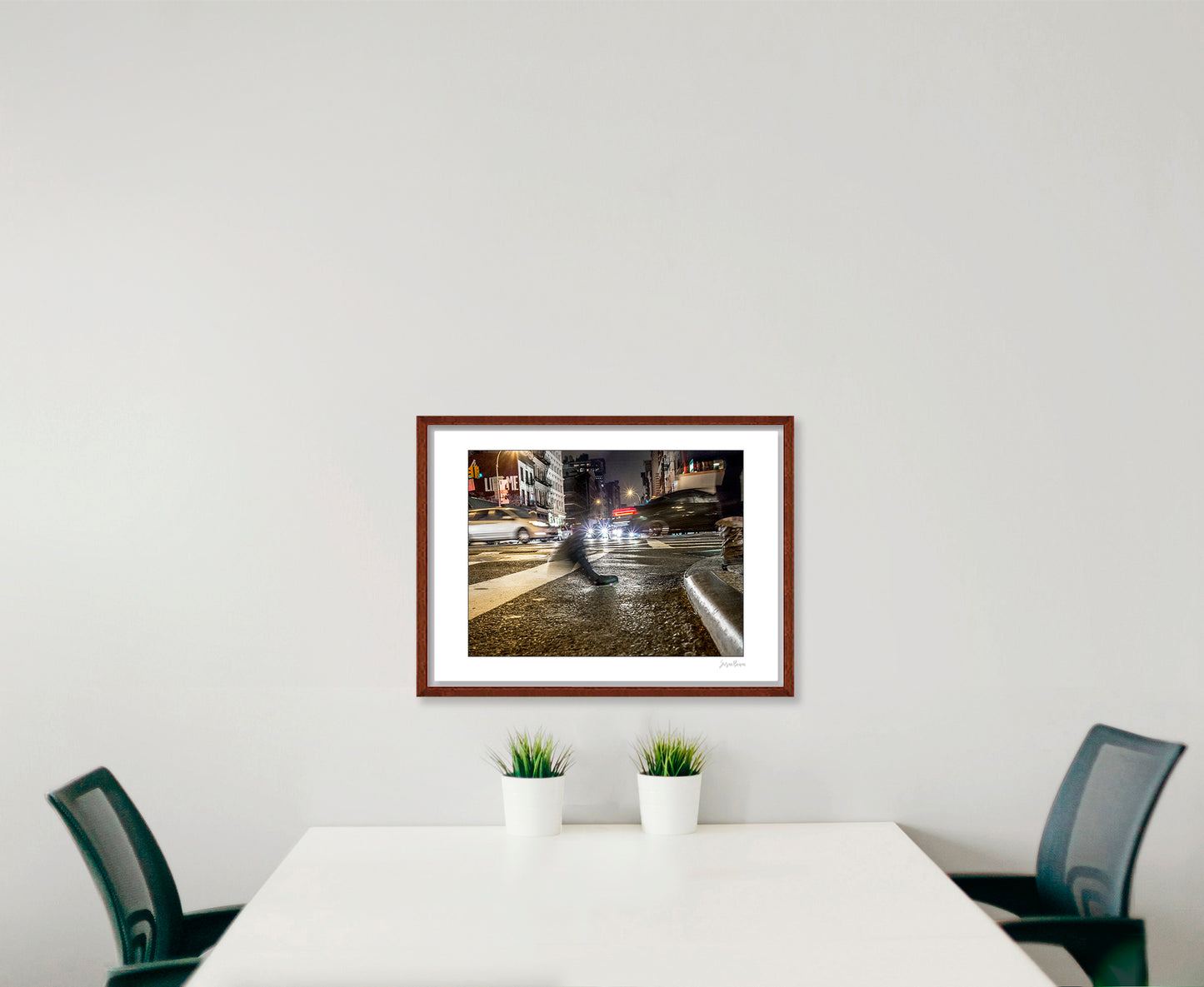 Photograph of a blurred foot crossing wet pavement in Chinatown at night in New York City with low perspective
