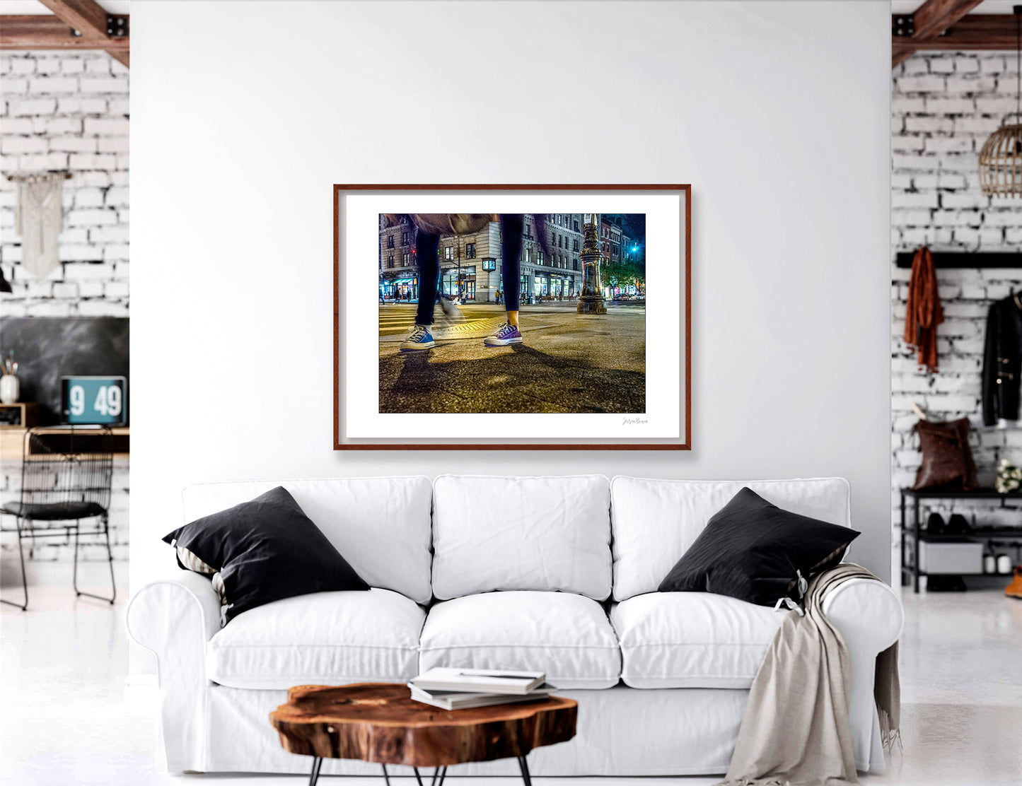 Photograph of two mis-matched legs of different people at night in New York City with low perspective