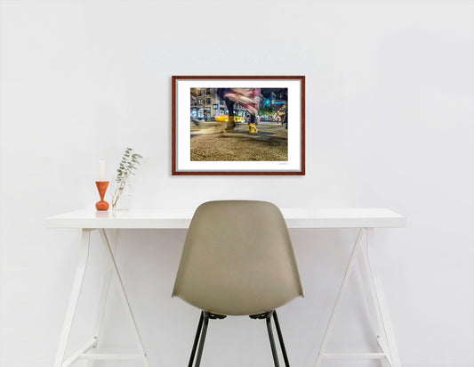 Photography of blurry swinging clothing and 2 mis-matched legs in New York City with low perspective