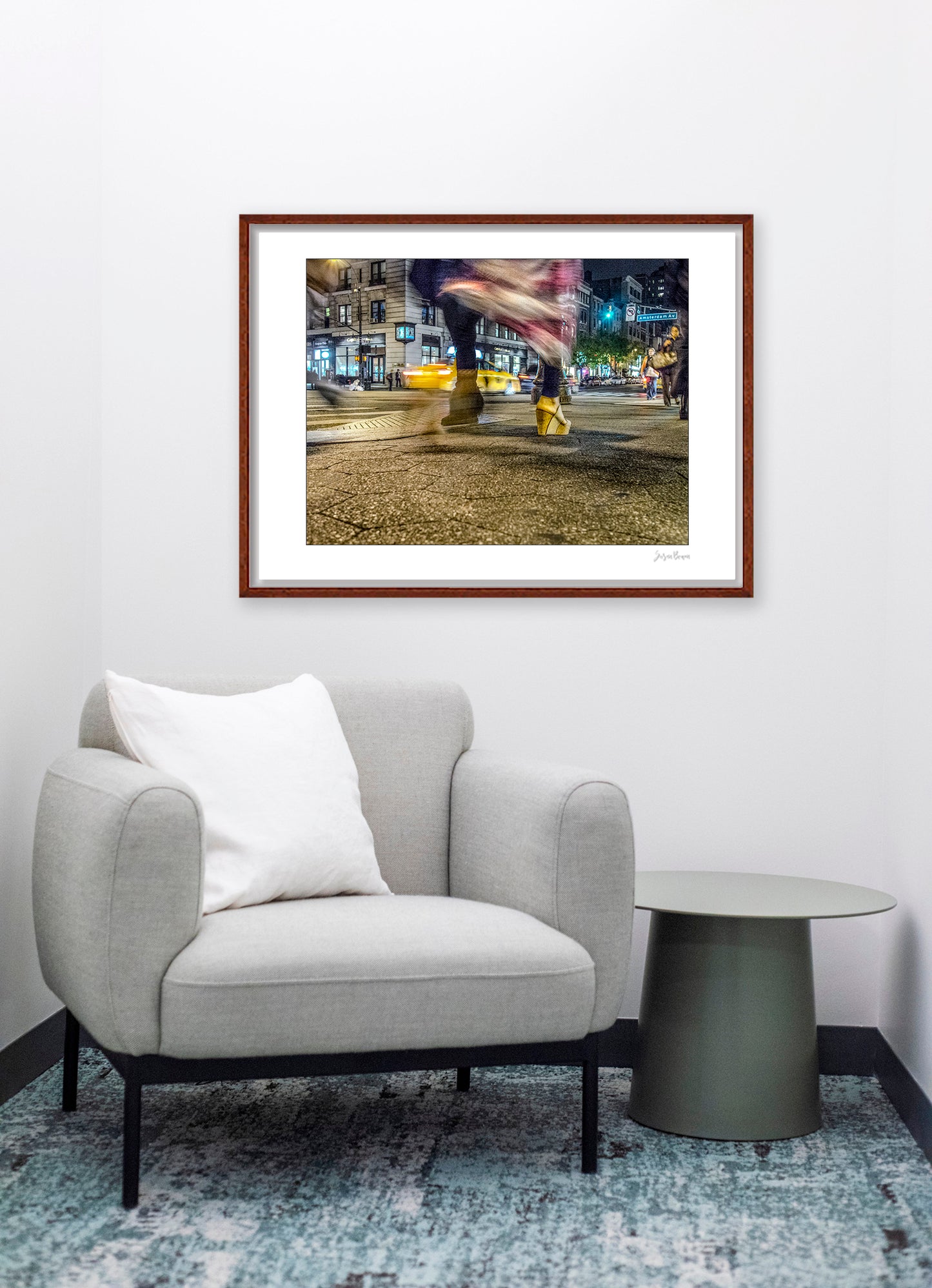 Photography of blurry swinging clothing and 2 mis-matched legs in New York City with low perspective