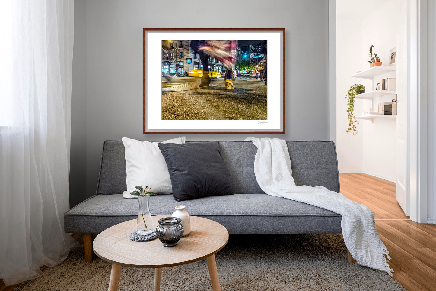 Photography of blurry swinging clothing and 2 mis-matched legs in New York City with low perspective