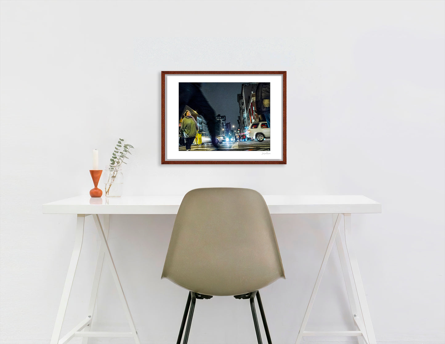 Photograph of blurry leg and person crossing intersection in Chinatown in New York City with low perspective