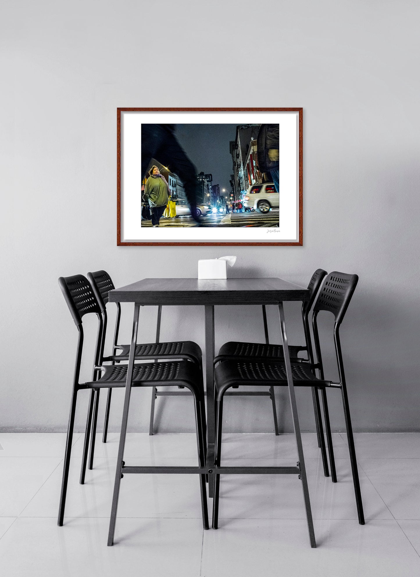 Photograph of blurry leg and person crossing intersection in Chinatown in New York City with low perspective
