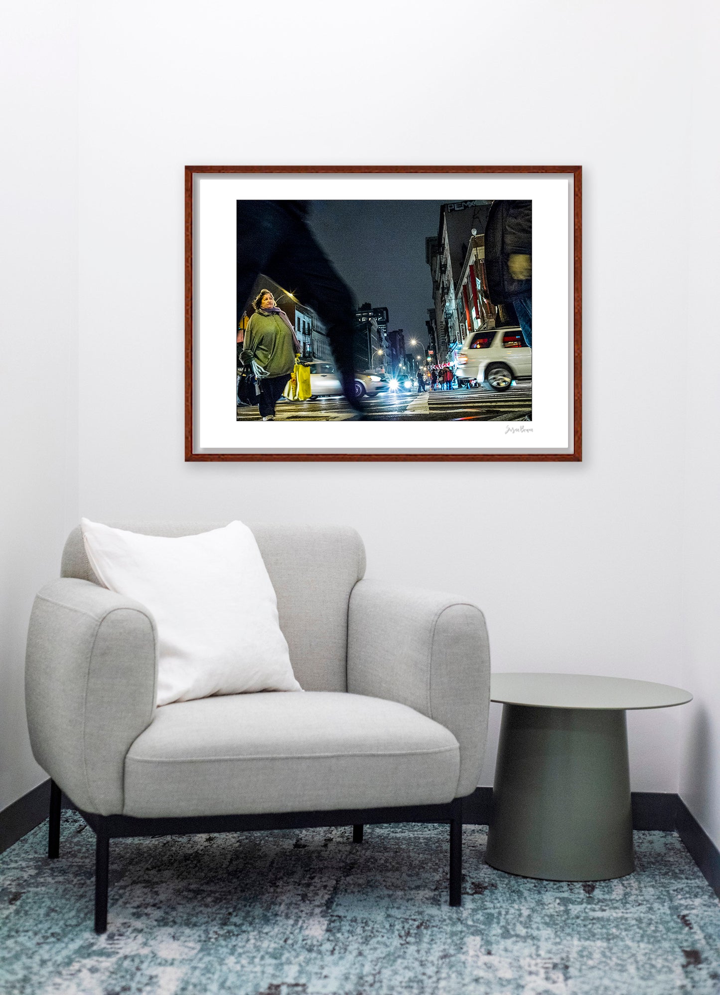 Photograph of blurry leg and person crossing intersection in Chinatown in New York City with low perspective