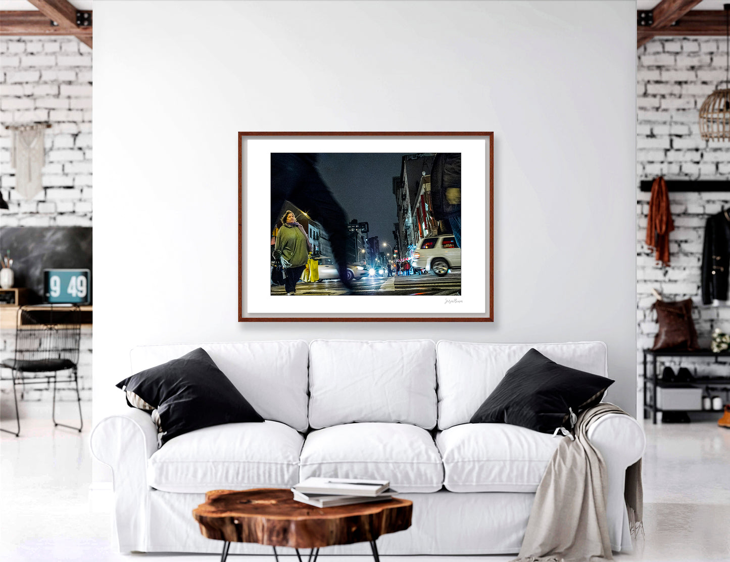 Photograph of blurry leg and person crossing intersection in Chinatown in New York City with low perspective