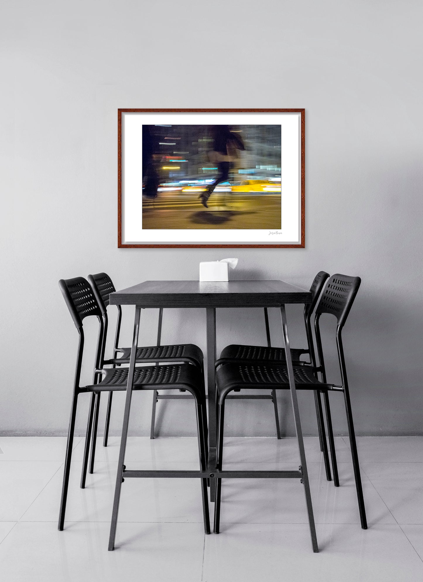 Photograph of person walking using panning technique lots of movement and color in New York City with low perspective
