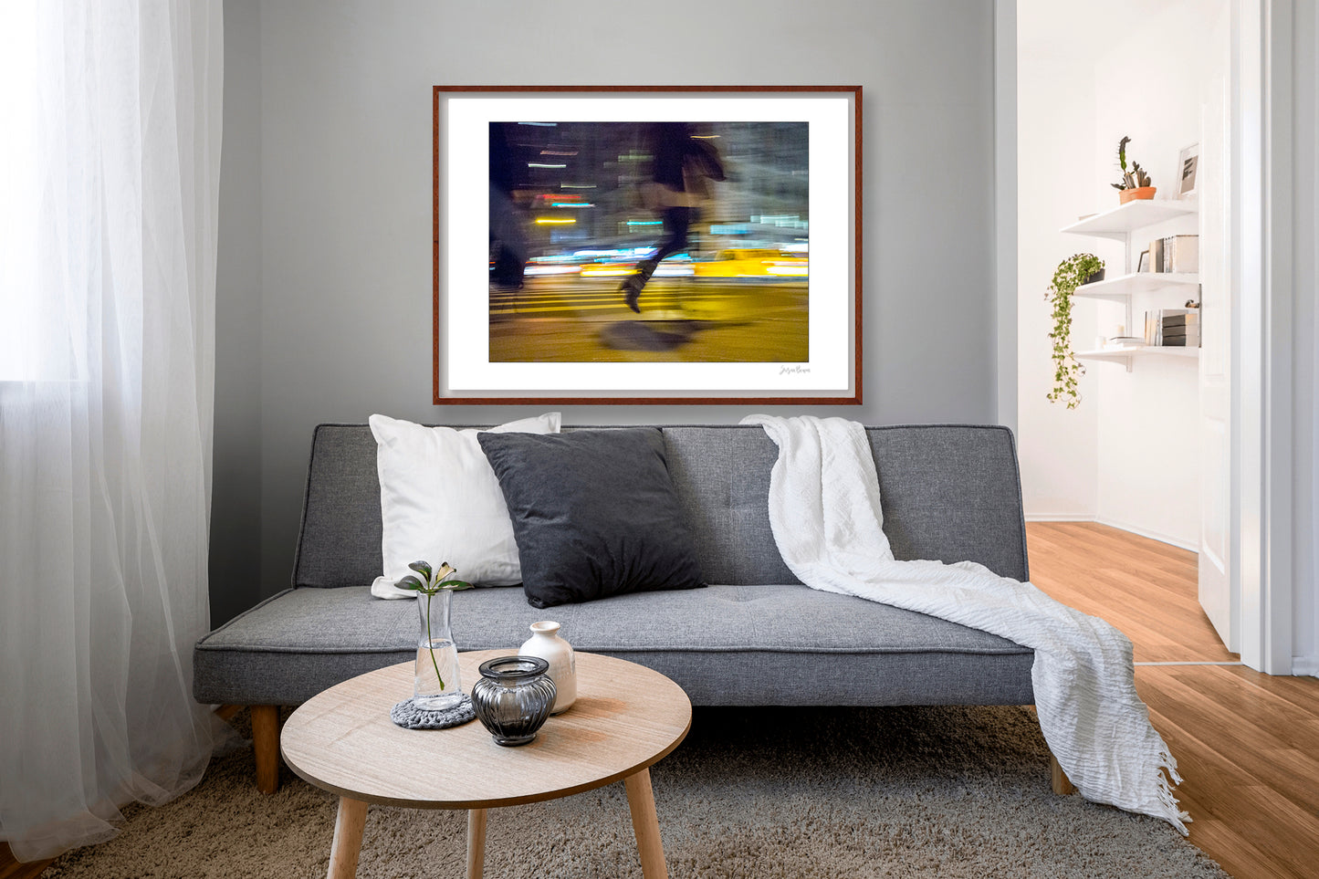 Photograph of person walking using panning technique lots of movement and color in New York City with low perspective