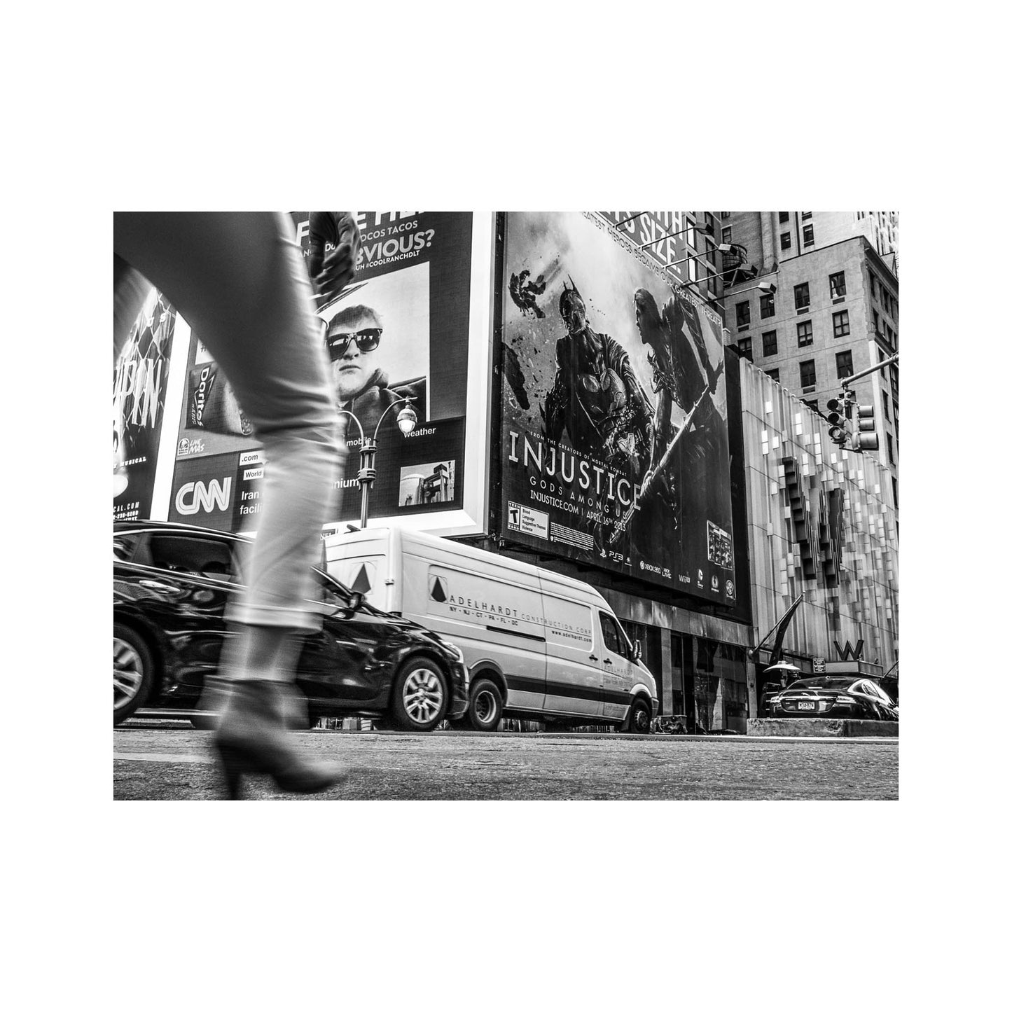 Book of black & White photographs of people walking in New York City with low perspective