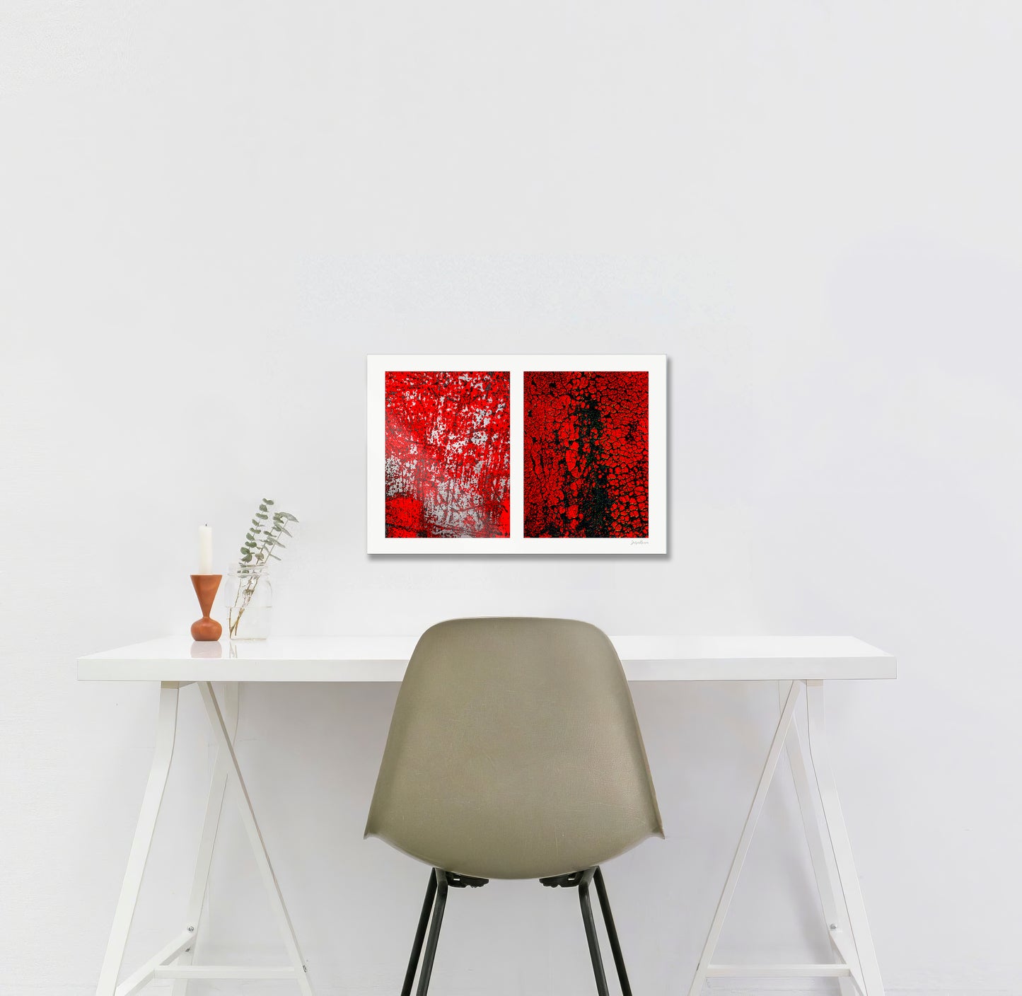 Abstract photographic diptych of highly textured surfaces in red, black, and white. Example of small size in acrylic shown in a home office.