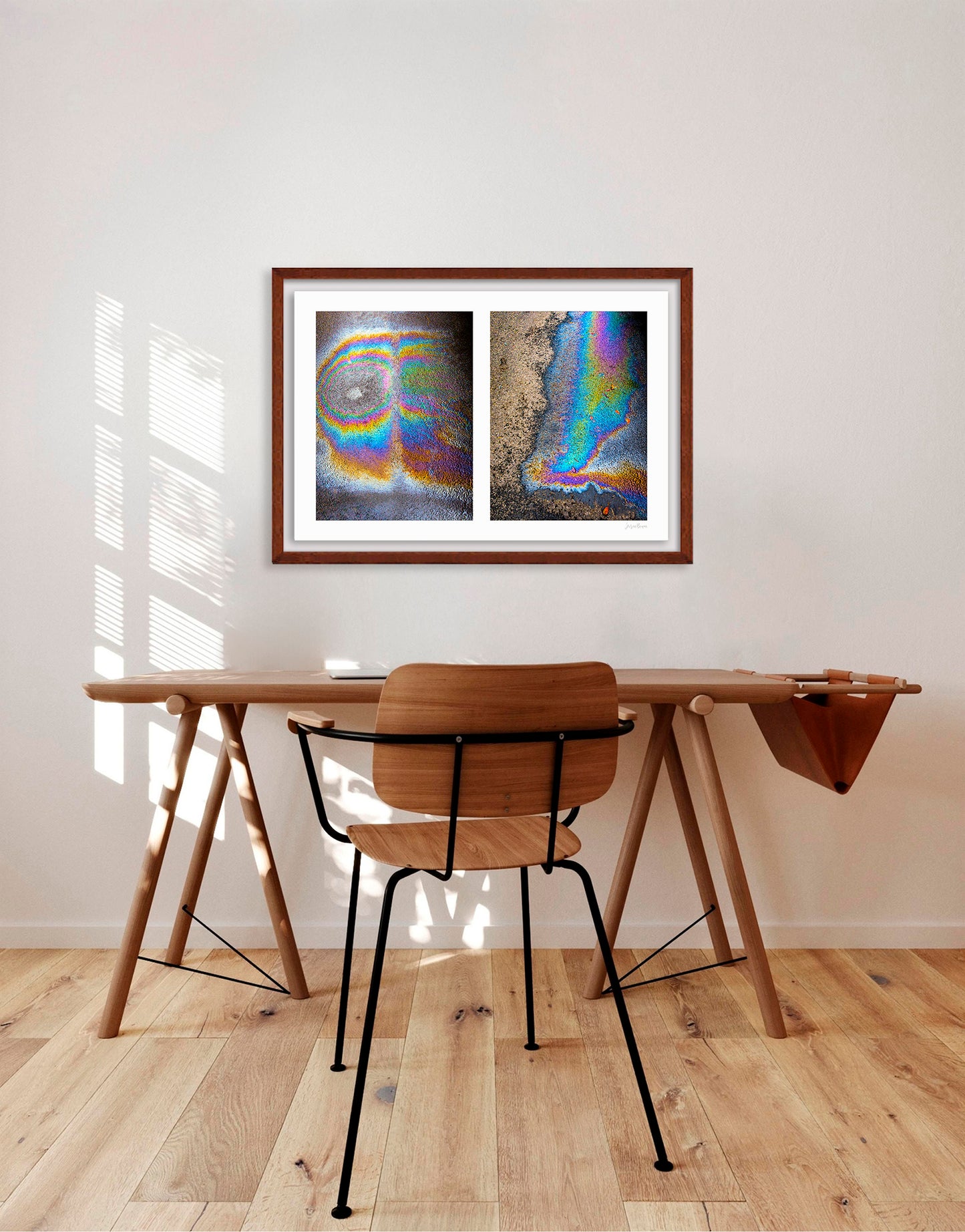 A diptych of two abstract photographs of oil spills on an asphalt surface, with vibrant multicolored patterns.