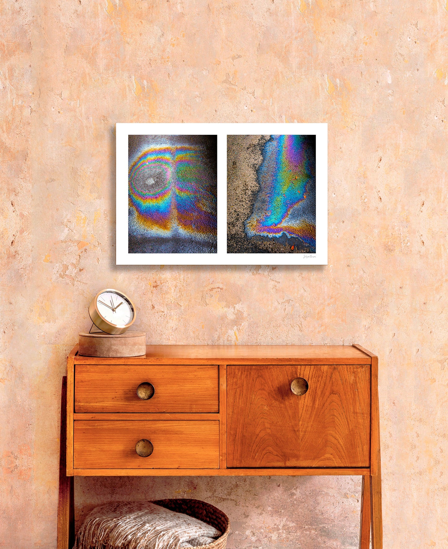 A diptych of two abstract photographs of oil spills on an asphalt surface, with vibrant multicolored patterns.