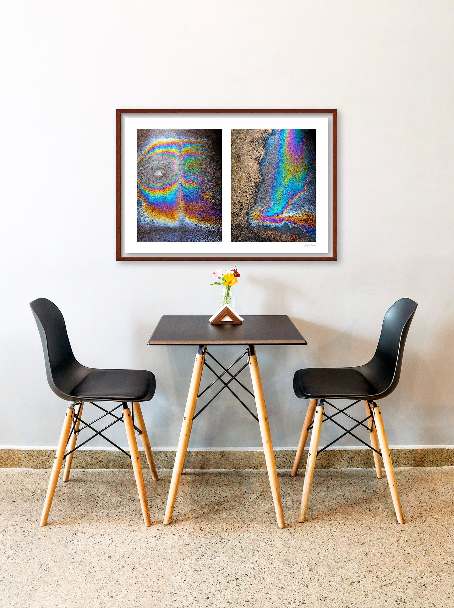 A diptych of two abstract photographs of oil spills on an asphalt surface, with vibrant multicolored patterns.