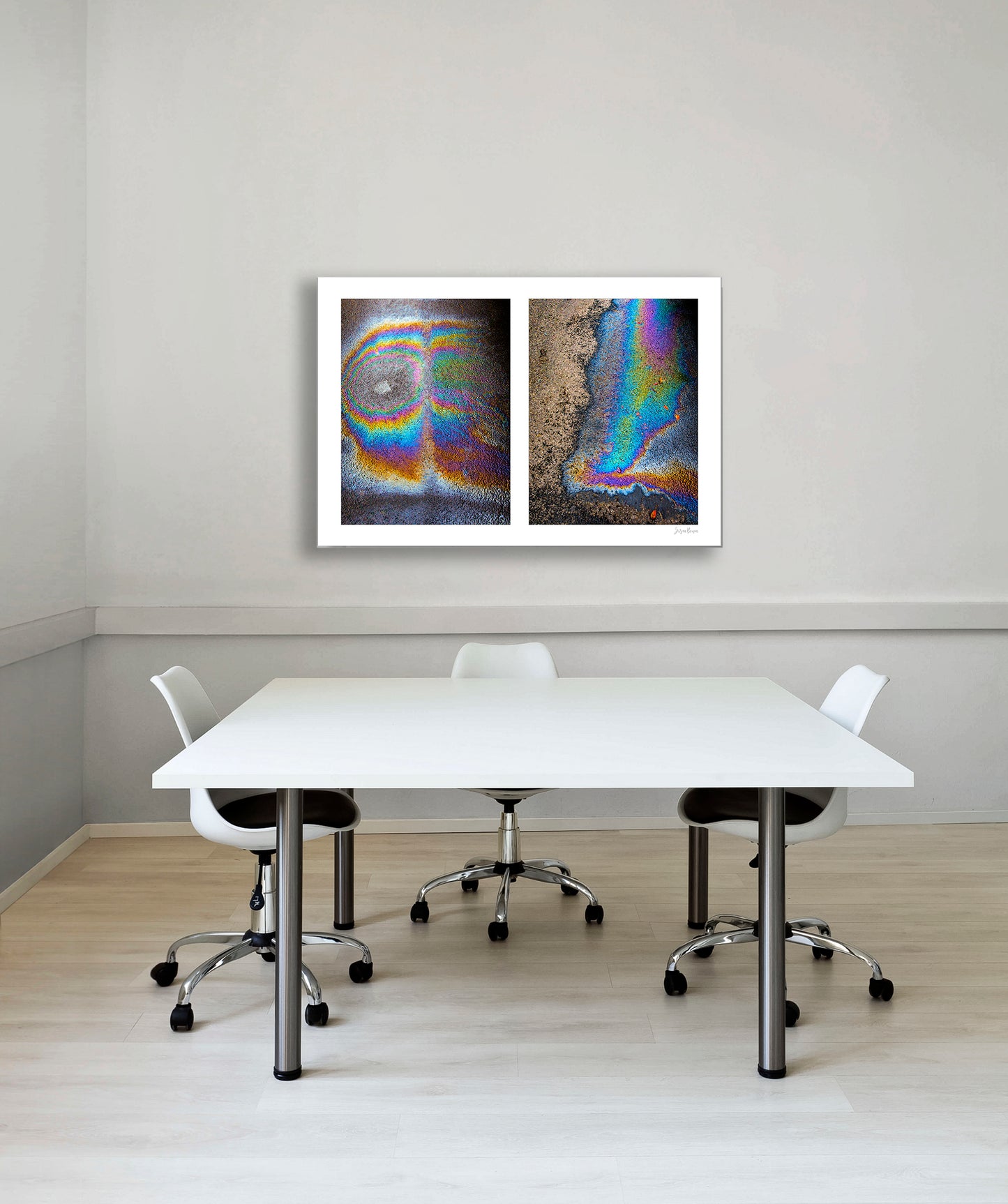 A diptych of two abstract photographs of oil spills on an asphalt surface, with vibrant multicolored patterns.