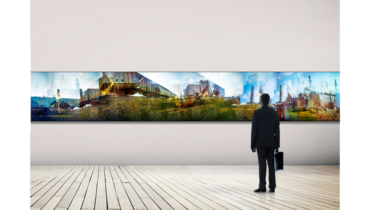 Overlapping multiple exposure shot on film of train approaching power plant