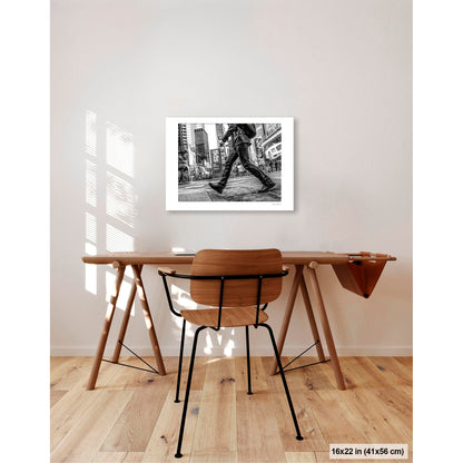 Canal Street, Waving Dress artwork by Susan Bowen, shown as 16x22 print. Features B&W low-angle photograph of a woman in a striped dress mid-stride on a Canal Street crosswalk, skirt in motion.