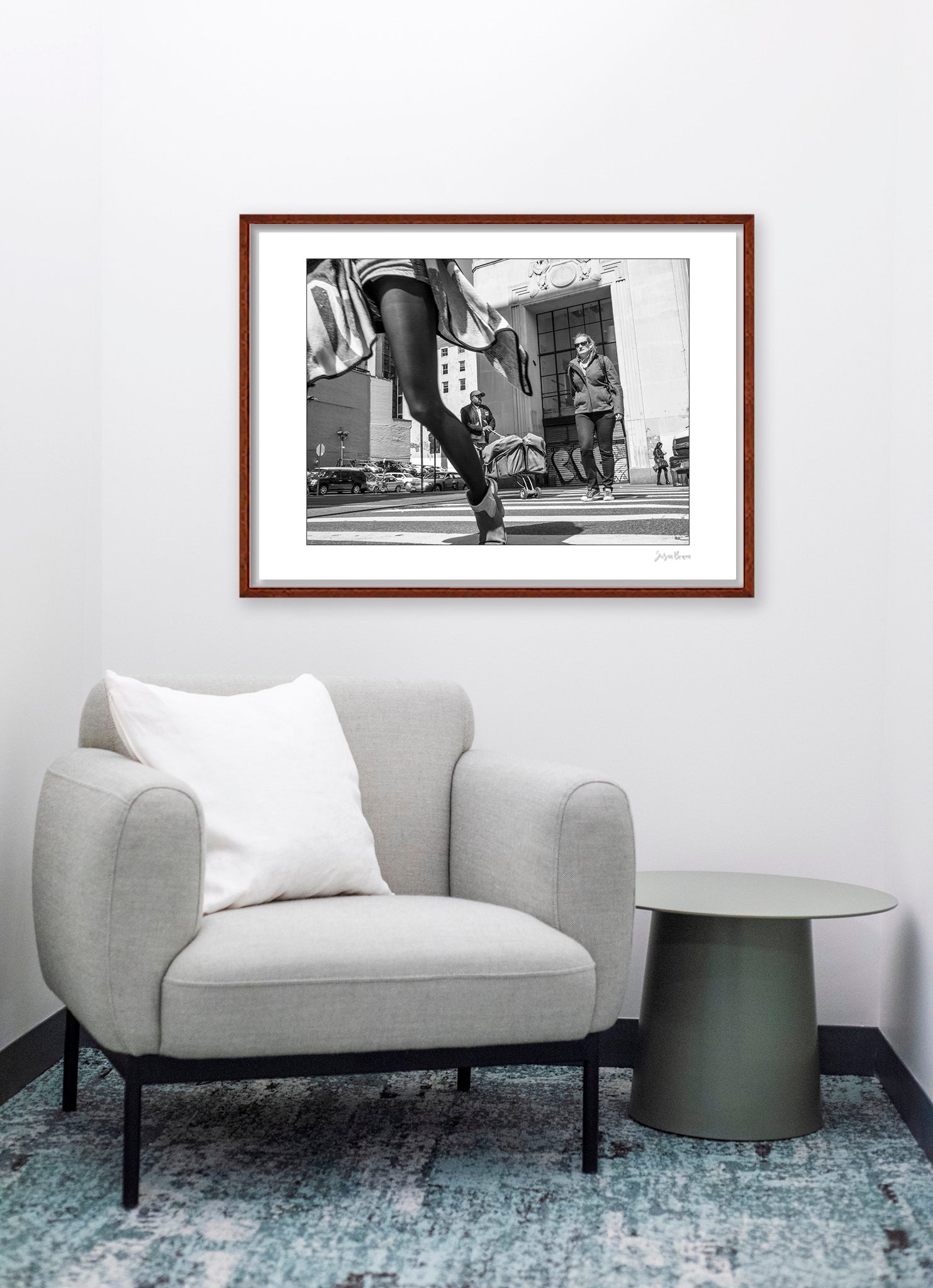 Black & White photograph of people walking in New York City with low perspective