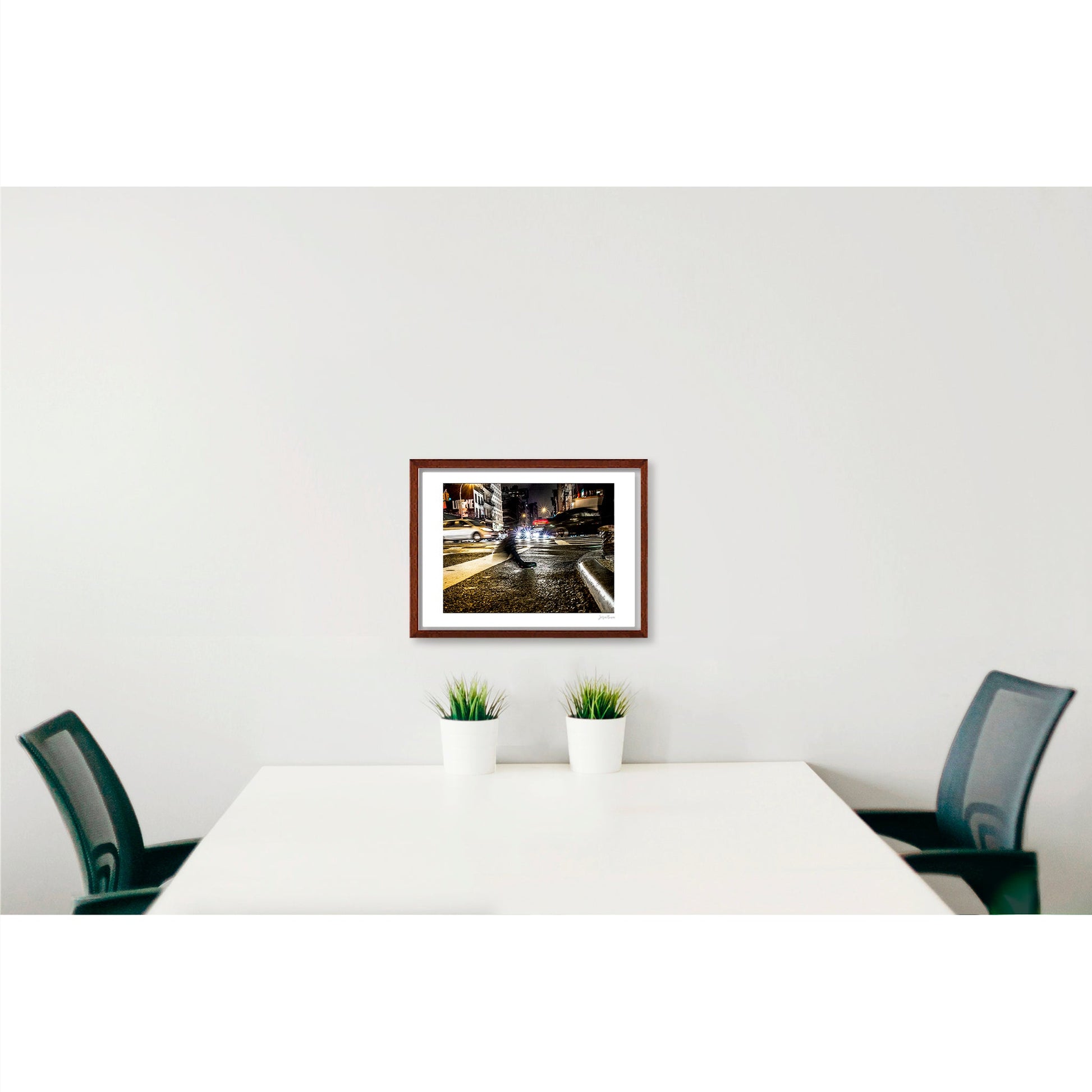 Photograph of a blurred foot crossing wet pavement in Chinatown at night in New York City with low perspective
