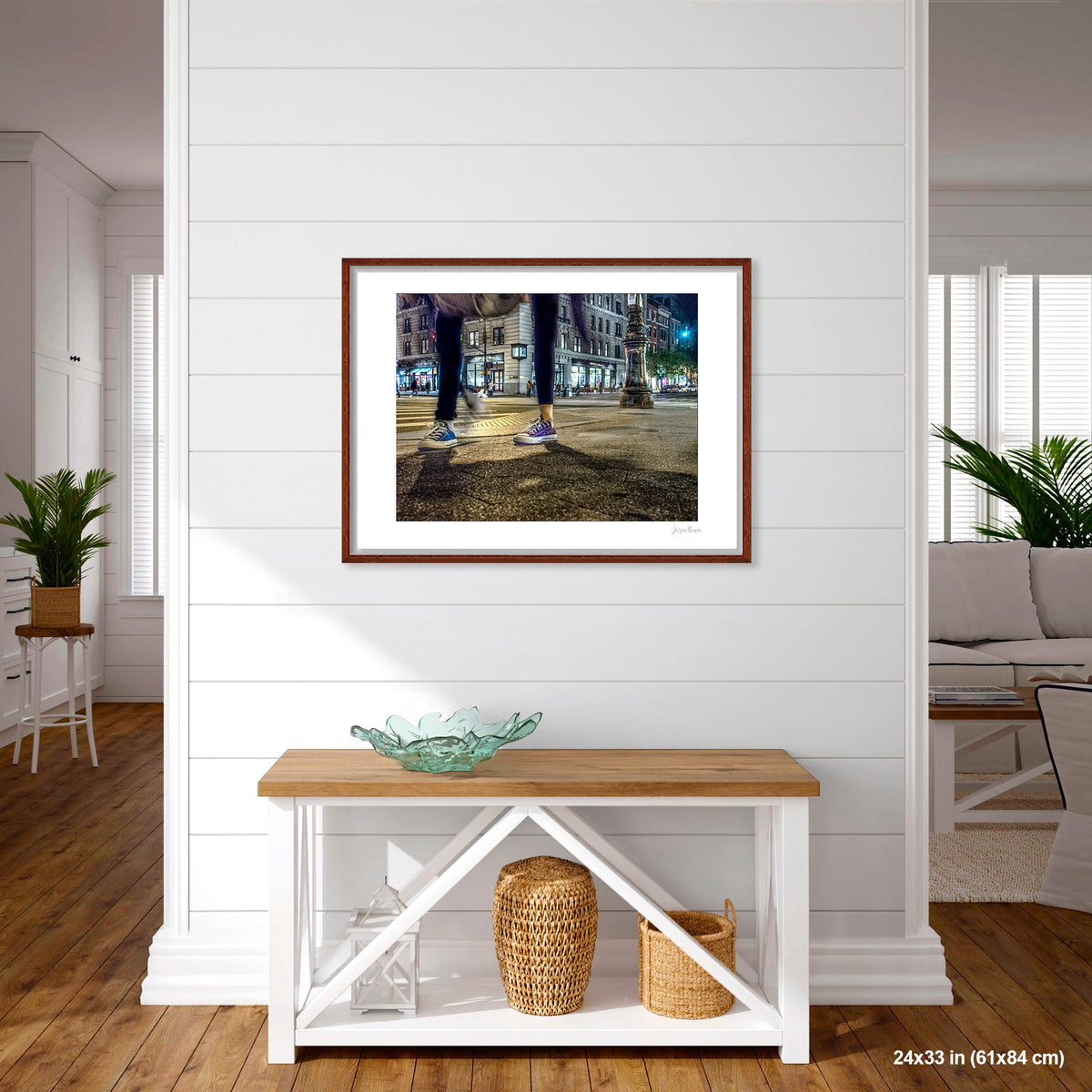 Mis-Matched Legs artwork by Susan Bowen, shown as 24x33 framed print. Features night photograph of two mismatched pairs of Converse sneakers at a lit NYC intersection, one still, one in motion.