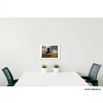 High-Heeled Shoe and Bus artwork by Susan Bowen, shown as 11x15 print. Features long-exposure night photograph of a single high-heeled shoe on a NYC crosswalk as a city bus streaks past behind it.