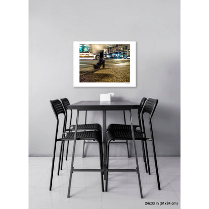 High-Heeled Shoe and Bus artwork by Susan Bowen, shown as 24x33 print. Features long-exposure night photograph of a single high-heeled shoe on a NYC crosswalk as a city bus streaks past behind it.