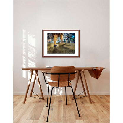 Photography of blurry swinging clothing and legs in New York City with low perspective