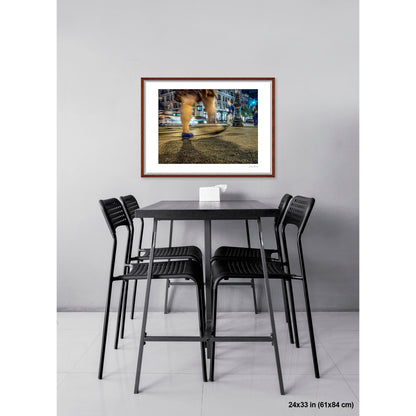 Swish of Striped Fabric artwork by Susan Bowen, shown as 24x33 framed print. Features long-exposure night photograph of striped fabric and wedge heels in motion on Amsterdam Avenue, yellow cab streaking past.