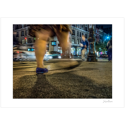 Photography of blurry swinging clothing and legs in New York City with low perspective