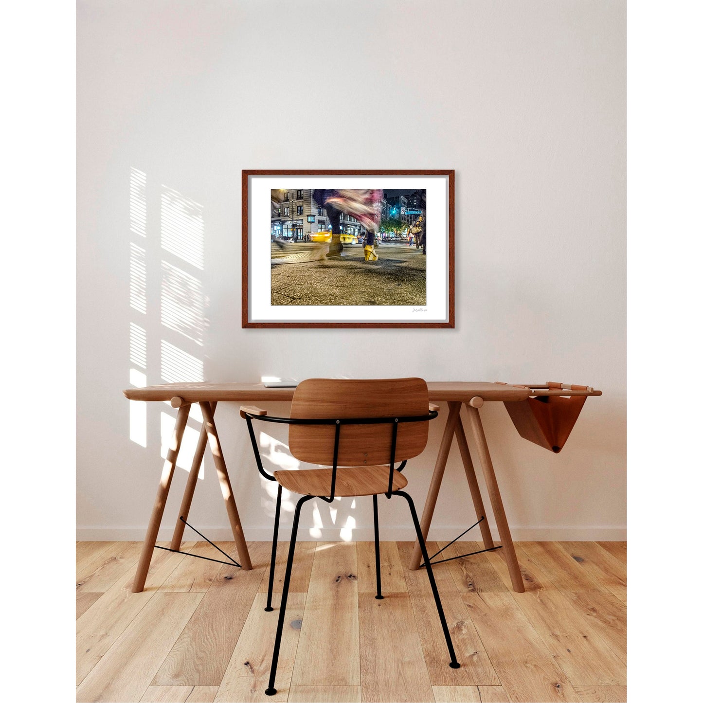 Photography of blurry swinging clothing and 2 mis-matched legs in New York City with low perspective