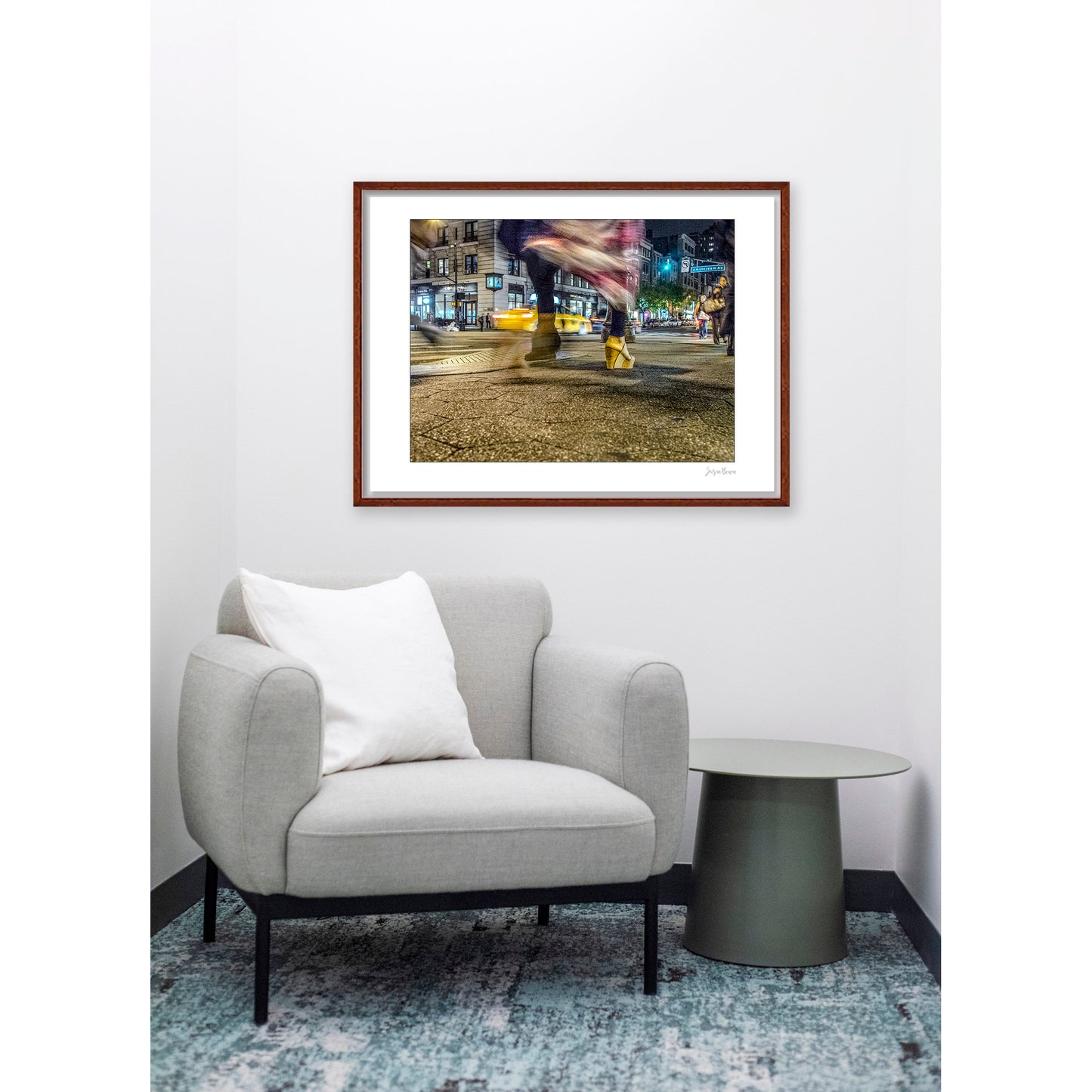 Photography of blurry swinging clothing and 2 mis-matched legs in New York City with low perspective