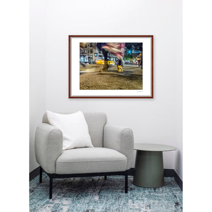 Photography of blurry swinging clothing and 2 mis-matched legs in New York City with low perspective