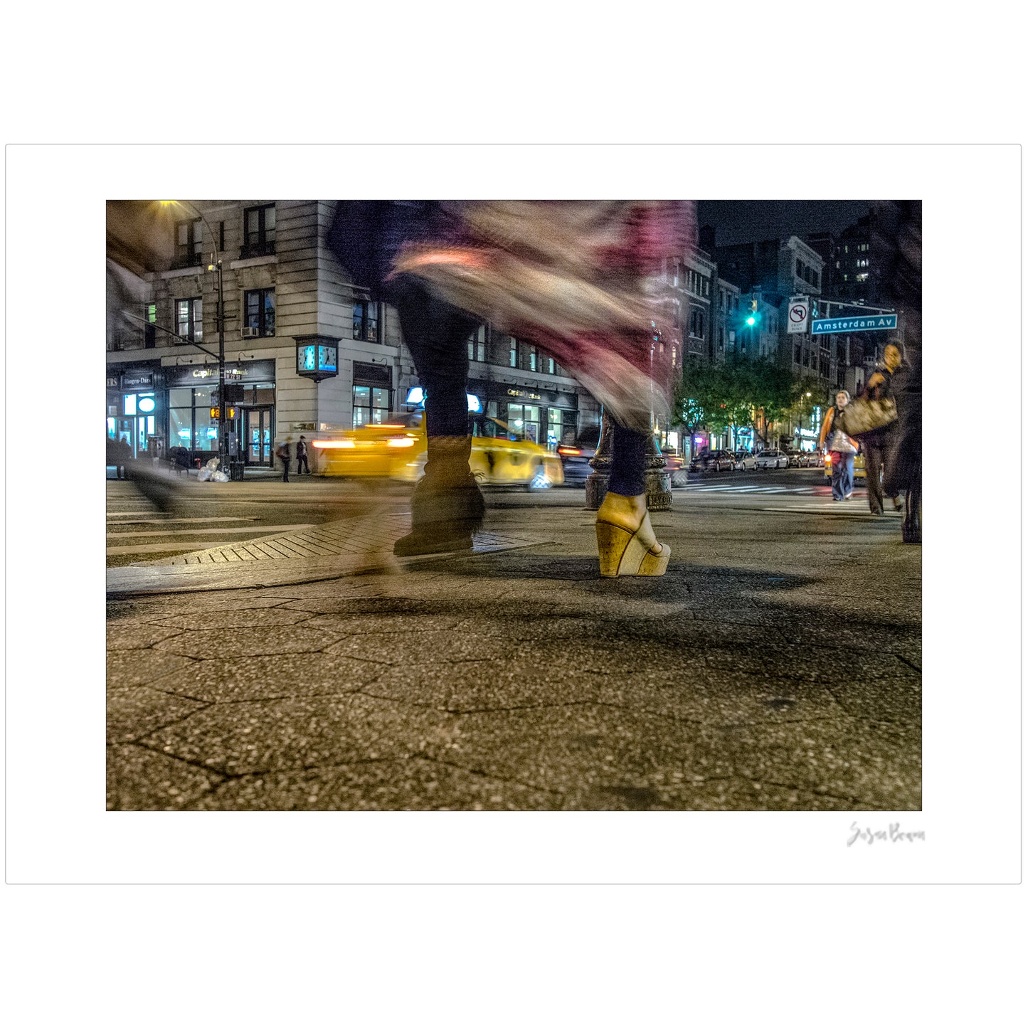 Photography of blurry swinging clothing and 2 mis-matched legs in New York City with low perspective