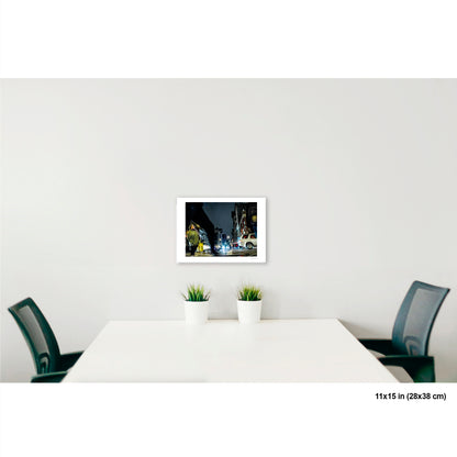 Arching Leg and Figure artwork by Susan Bowen, shown as 11x15 print. Features night street photograph of a woman standing still at a Canal Street intersection as blurred figures and traffic rush past.