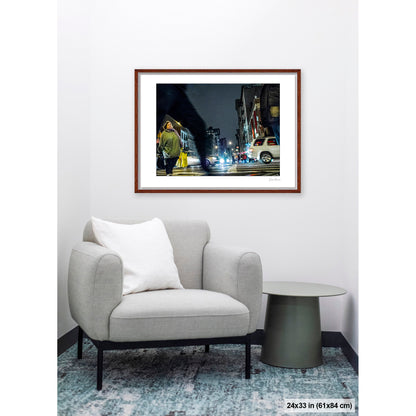 Arching Leg and Figure artwork by Susan Bowen, shown as 24x33 framed print. Features night street photograph of a woman standing still at a Canal Street intersection as blurred figures and traffic rush past.