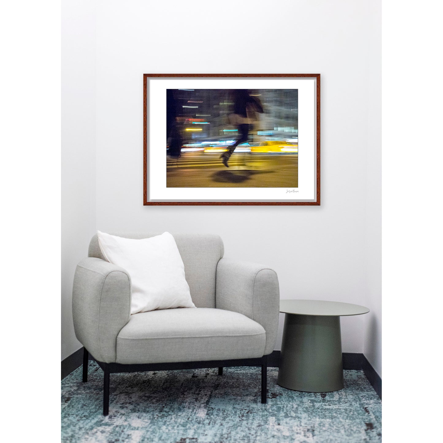 Photograph of person walking using panning technique lots of movement and color in New York City with low perspective