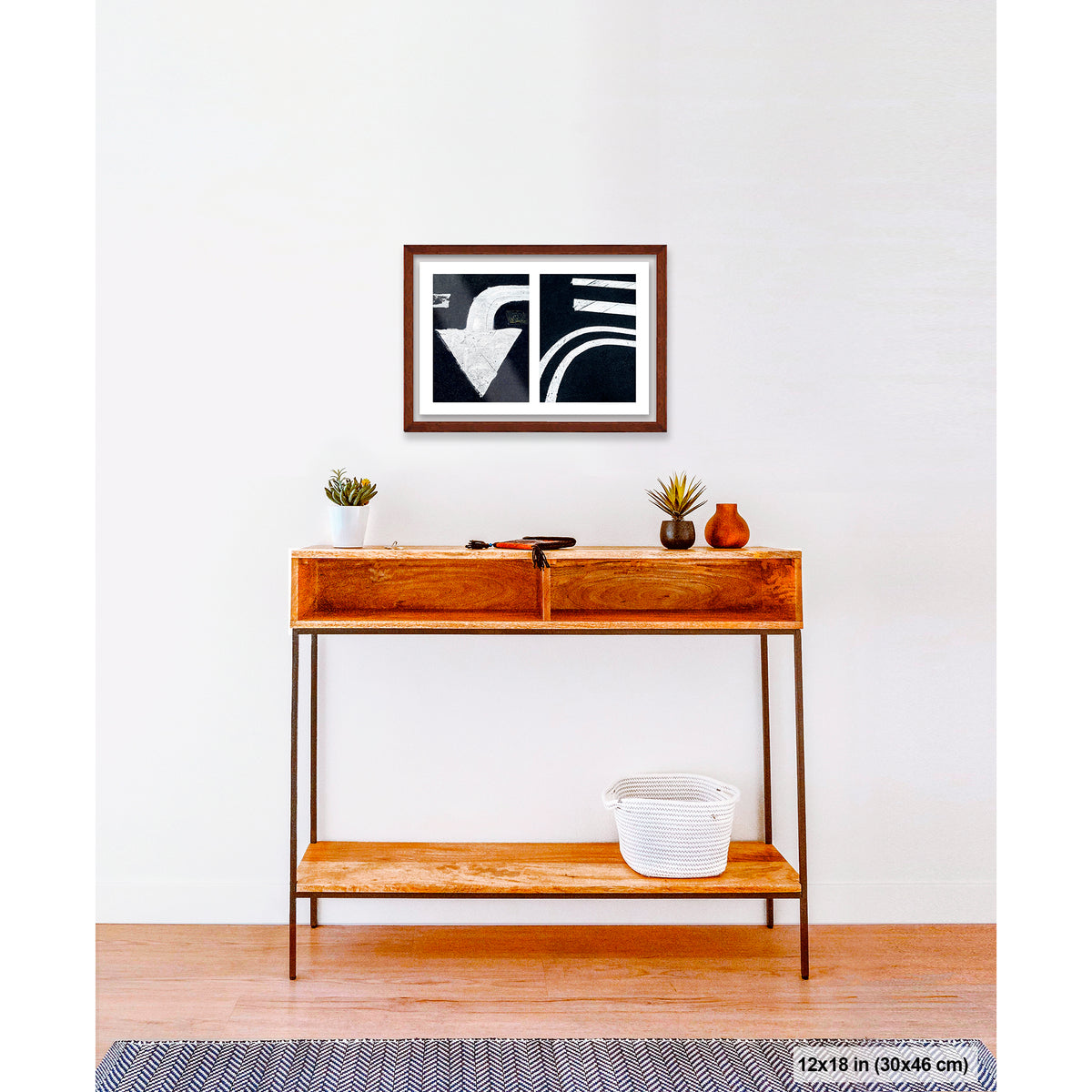 Arrow and Curved Line artwork by Susan Bowen, shown as 12x18 framed print. Features white arrow and sweeping road curves transformed into bold, high-contrast urban abstract photography.