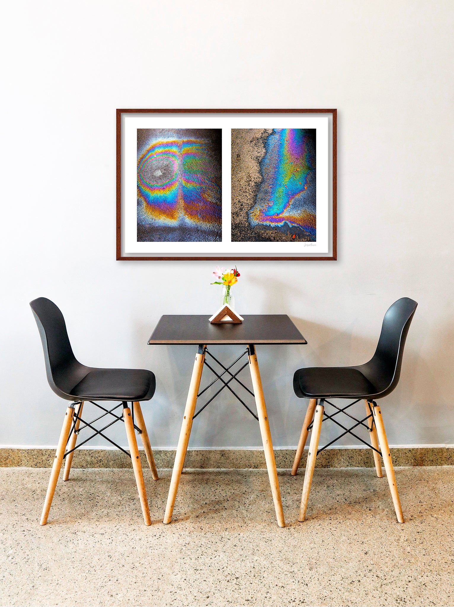 A diptych of two abstract photographs of oil spills on an asphalt surface, with vibrant multicolored patterns.