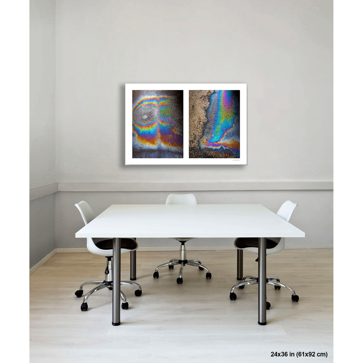 Oil Spill Pair artwork by Susan Bowen, shown as 24x36 print. Features iridescent oil spills on wet asphalt photographed as vivid abstract diptych, cycling through rainbow hues of blue, gold, and violet.