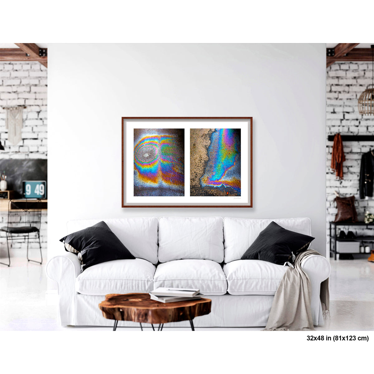 Oil Spill Pair artwork by Susan Bowen, shown as 32x48 framed print. Features iridescent oil spills on wet asphalt photographed as vivid abstract diptych, cycling through rainbow hues of blue, gold, and violet.
