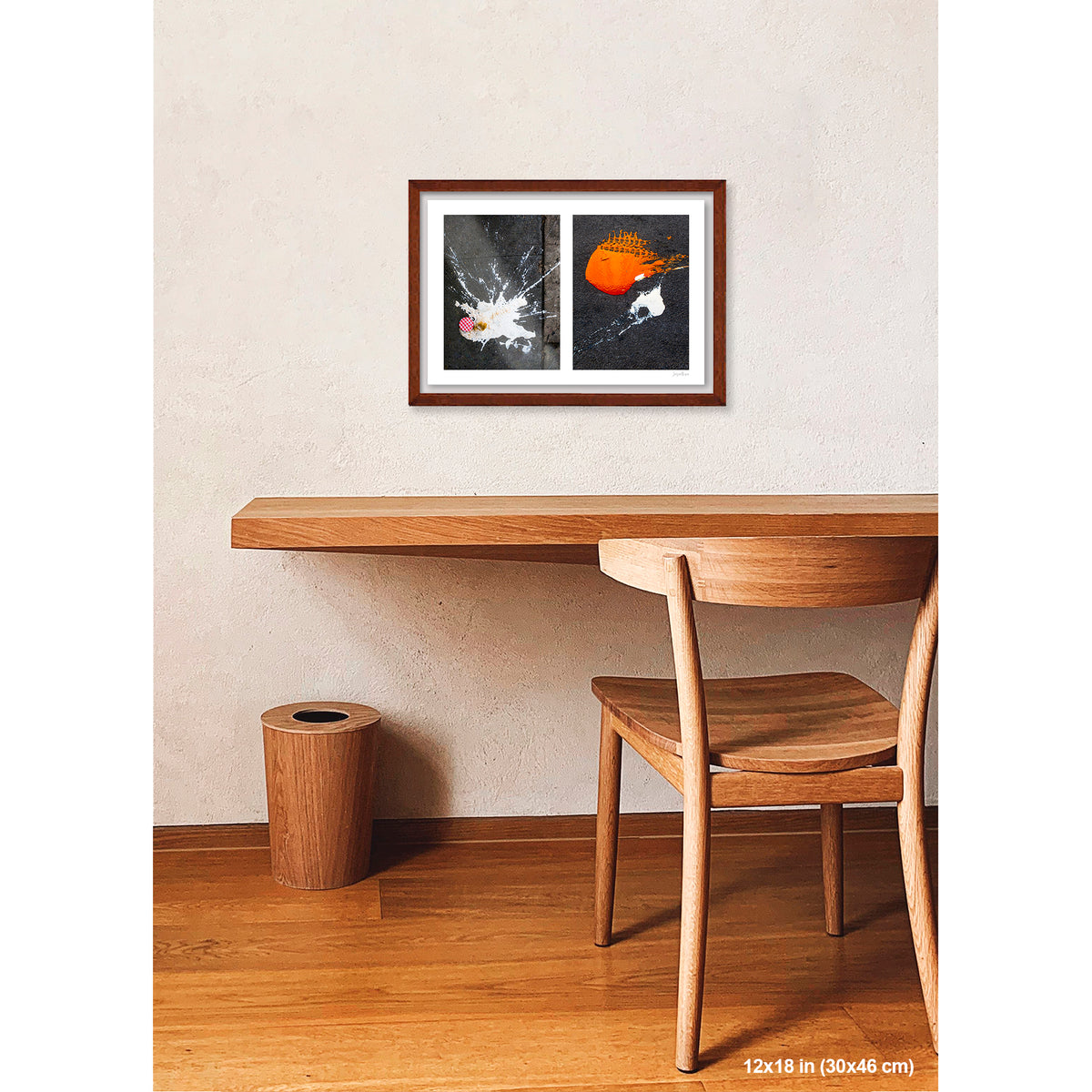 Dropped Cream and Orange Glob artwork by Susan Bowen, shown as 12x18 framed print. Features abstract diptych pairing a radiant white splatter with a bold orange paint spill on city pavement, two accidental forms in vivid contrast.